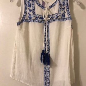 Cute white and blue top with tassels